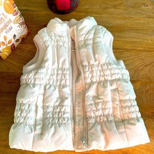 12mo. Girl white vest.